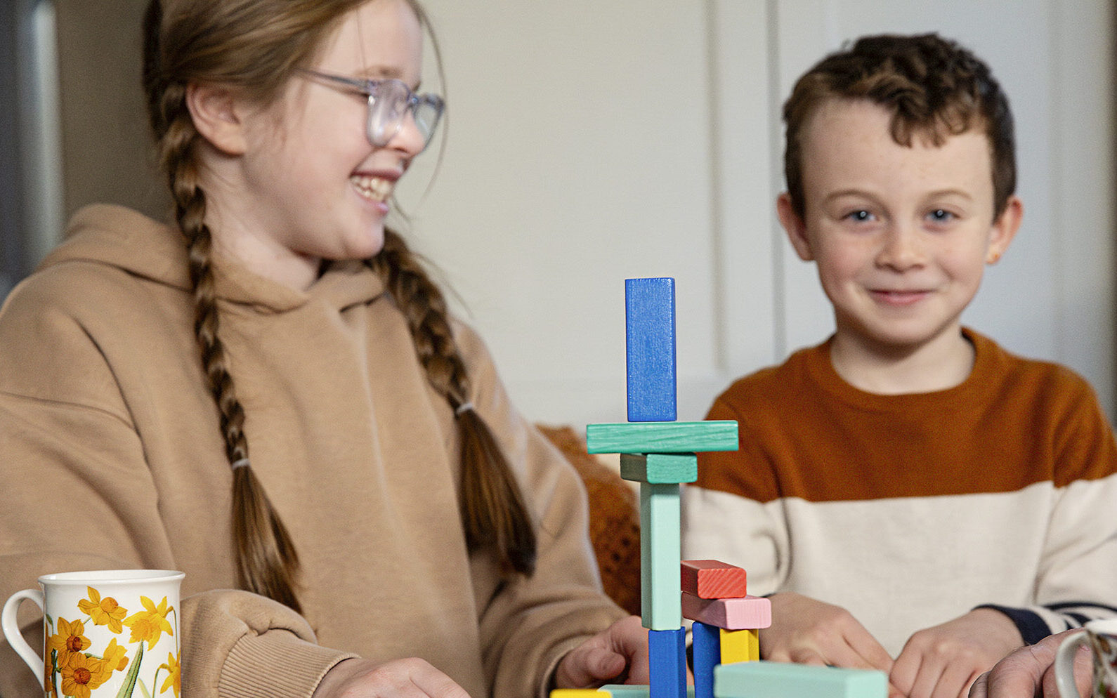 Young Boy and girl playing with blocks