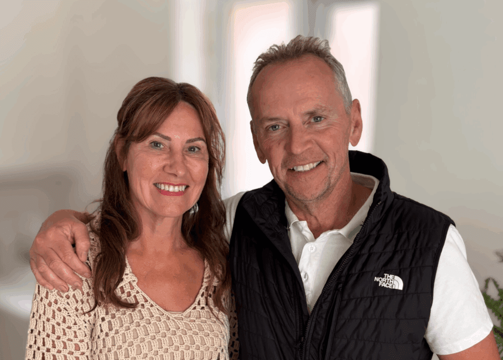 Foster carers Cheryl and Andy smiling